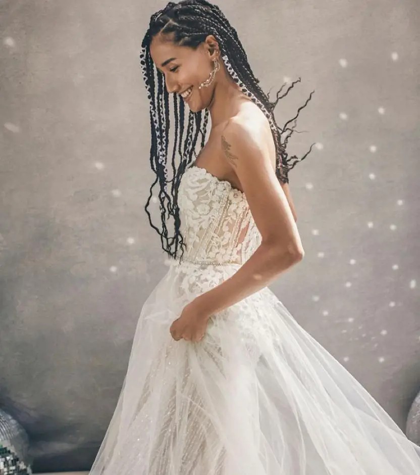 Model wearing a gown by Madison James