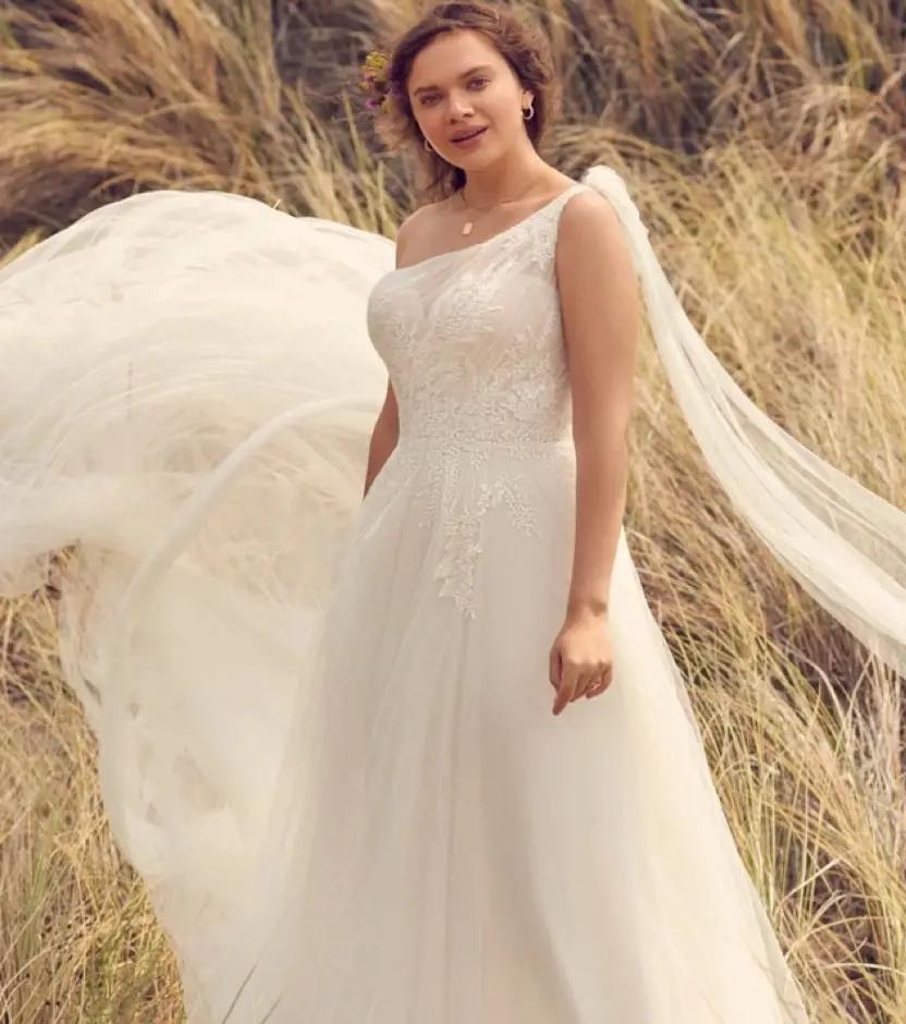Model wearing a gown by Rebecca Ingram
