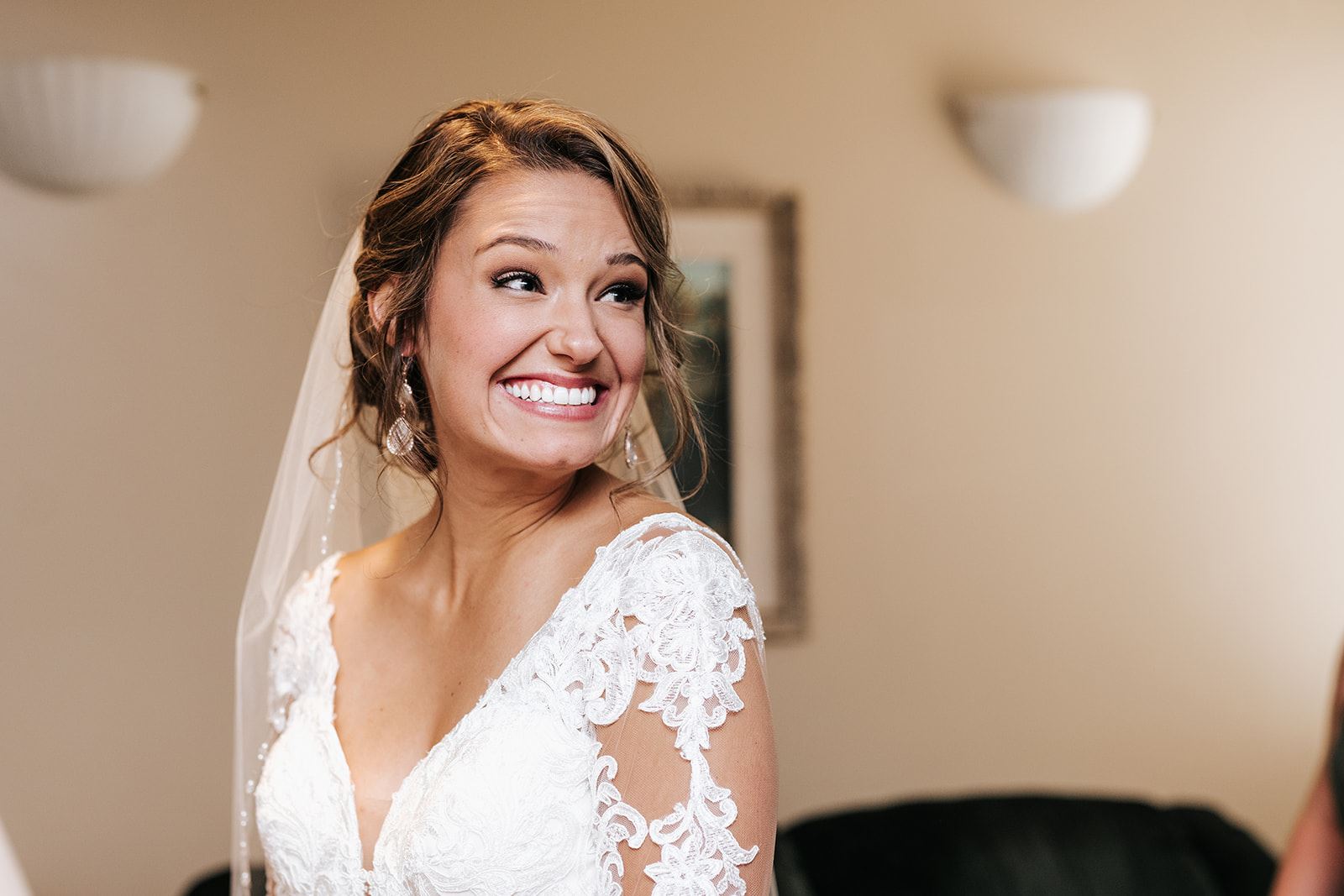 Model wearing a white gown