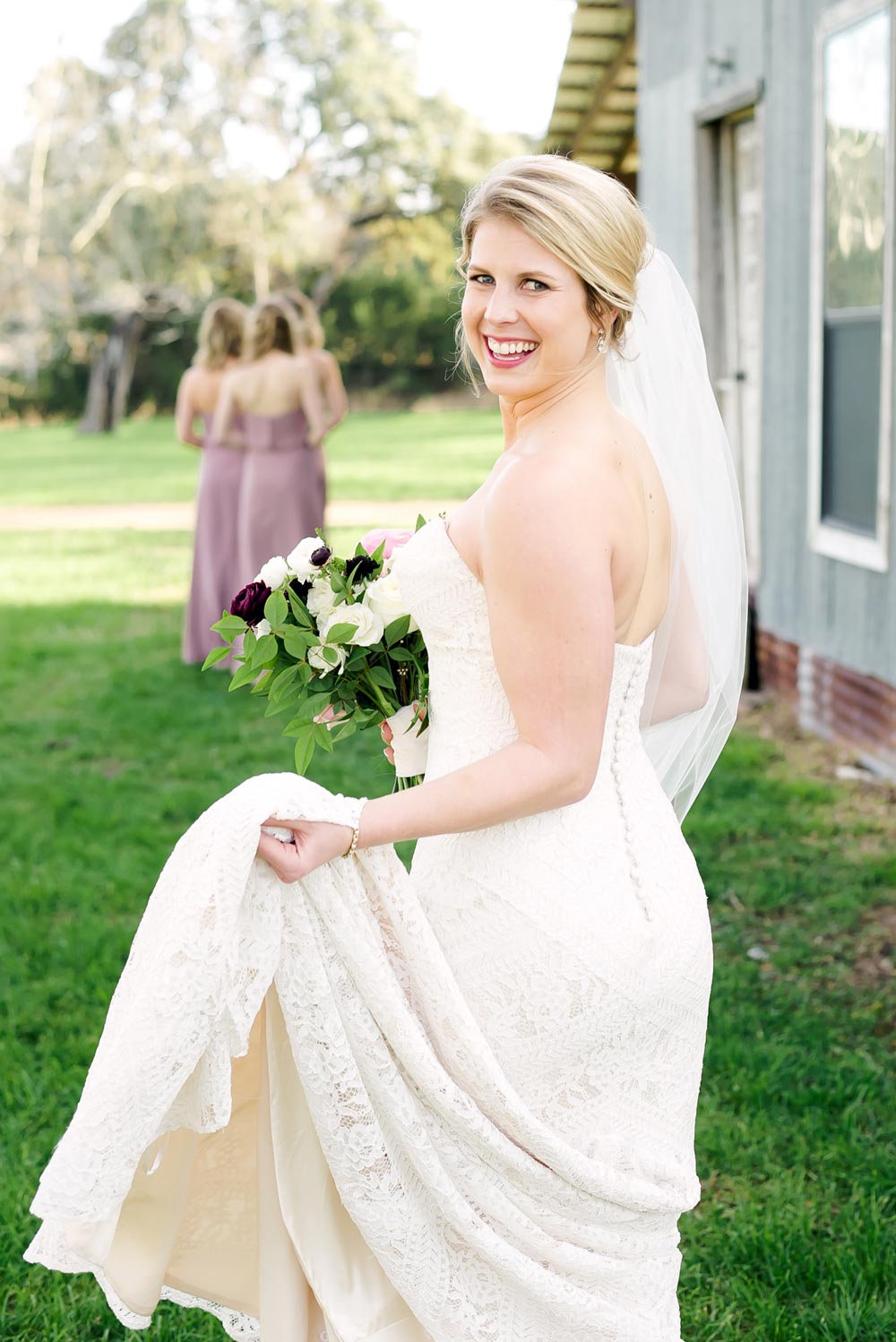 Model wearing a white gown on the grass