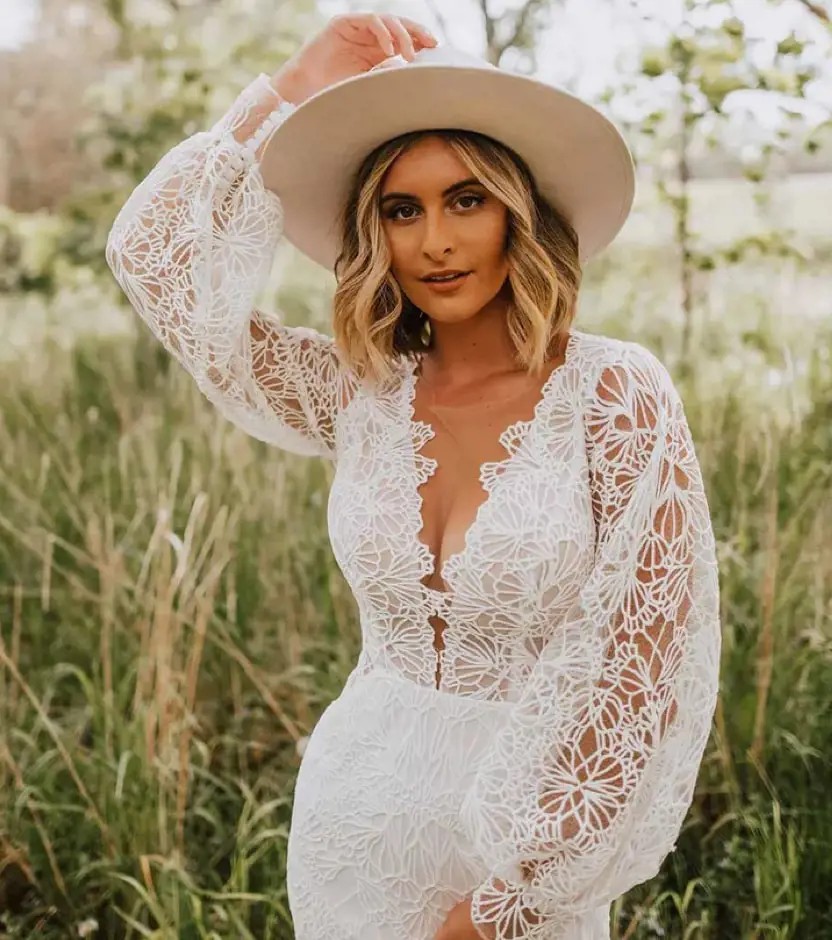 Model wearing a gown by Essense of Australia